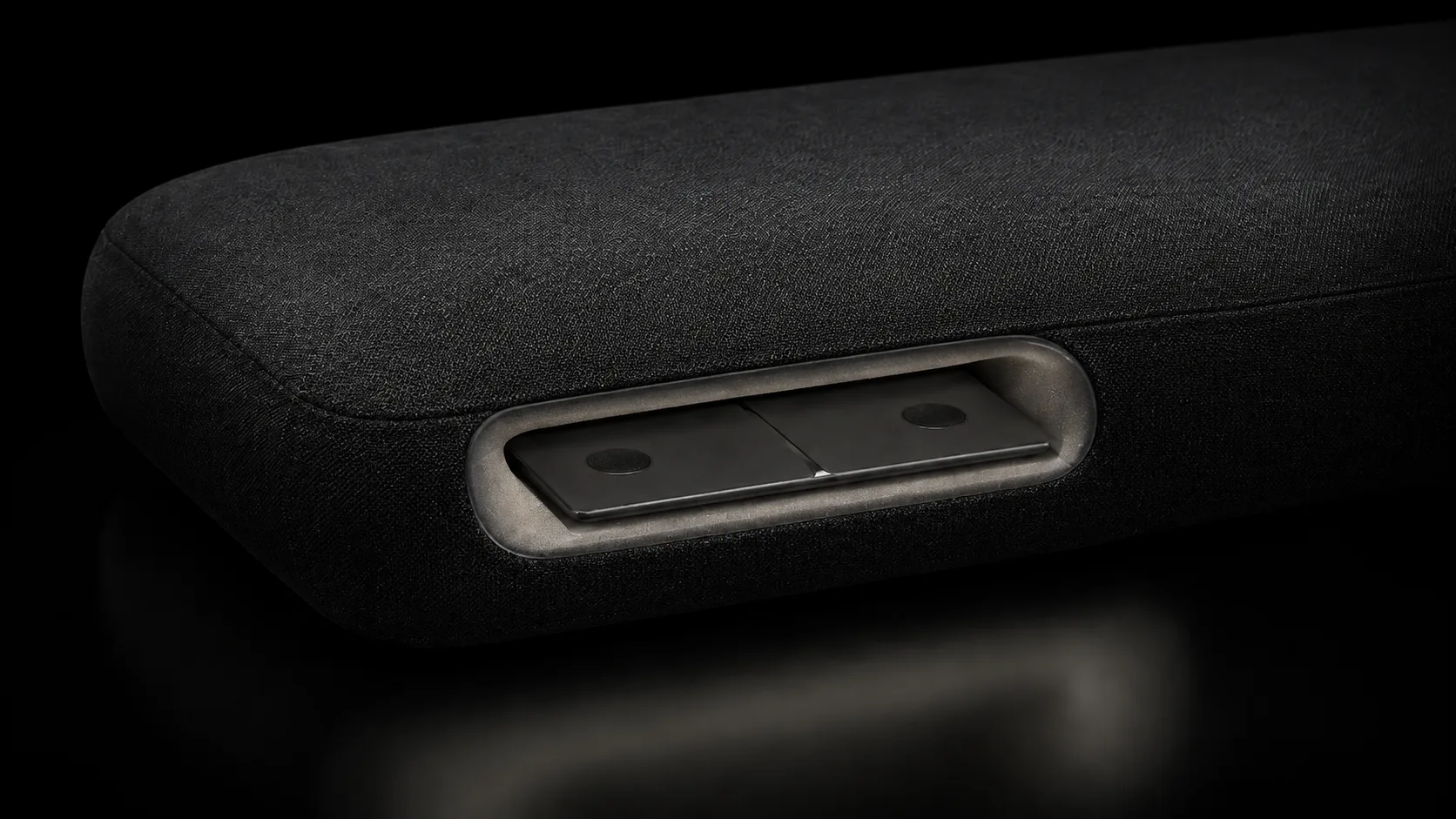 Close view of the removable Neruma audio pod resting inside its fitted pillow compartment